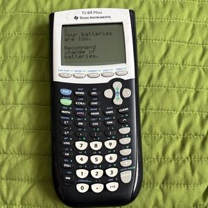 Texas Instruments TI-84 Plus Calculator in Black and White.